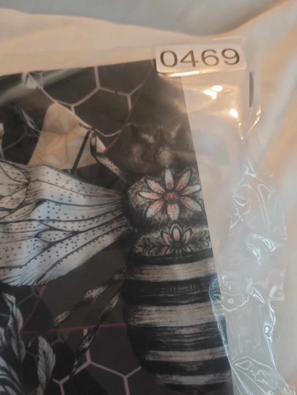 Black Floral Hexagon Print Leggings with Beige Accents - Picture 7 of 7